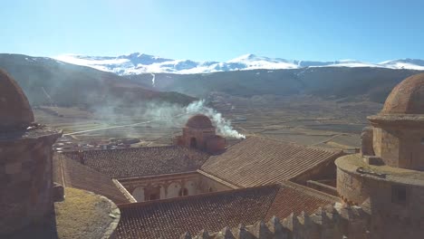 close aerial view of the tower and roof of the castle of la calahorra in spain