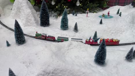 christmas train display in snowy landscape