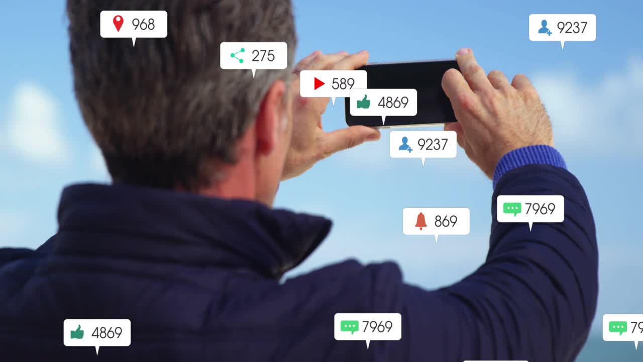 Man lifting phone and capturing beach scene, floating social icons boosting social media engagement