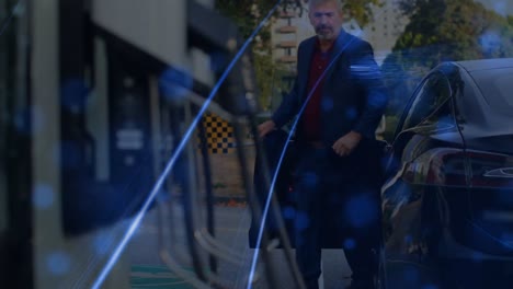 animation of blue light trails over caucasian senior businessman getting out of his car
