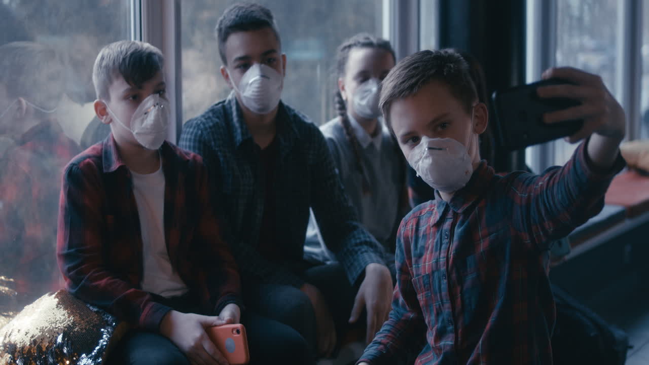 Teenagers Taking Selfie While Wearing Masks