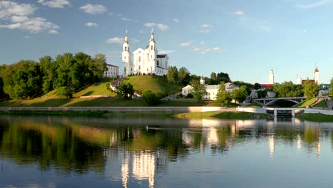 vitebsk, belarus. assumption cathedral church in upper town on uspensky mount hill and dvina river in sunny summer day. zoom, zoom in