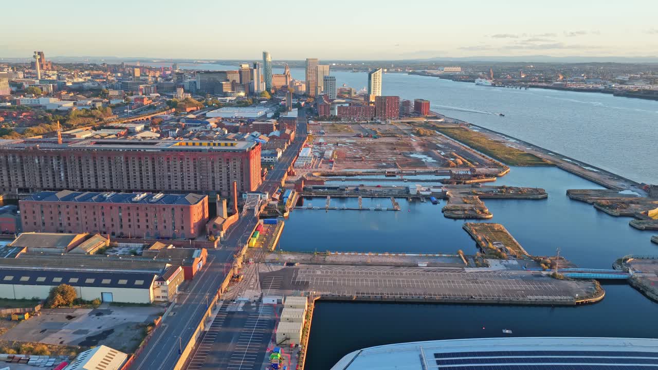 Cinematic aerial drone footage of the surrounding neighbourhood and housing near Everton FC’s new Bramley-Moore Dock stadium in Liverpool. Captured at sunset, this video highlights the areas nearby