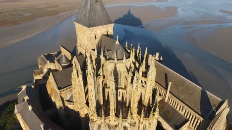 gothic spires and bell tower of mont saint-michel abbey, normandy in france