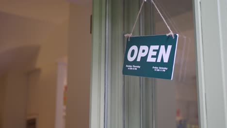 open sign on a shop door