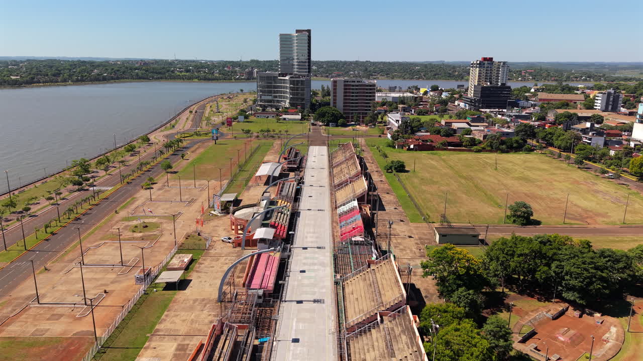 Aerial view of Sambodromo in Encarnación, perspective of city and Paraná River. Paraguay