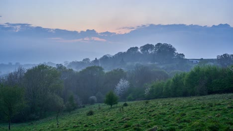 Timelapse-of-changing-weather-over-the-rolling-hills-of-rural-Devon,-England,-UK