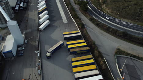 trucks and trailers in a parking lot