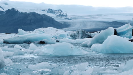 close up of glacial ice floating in jokulsarlon glacier lagoon, iceland