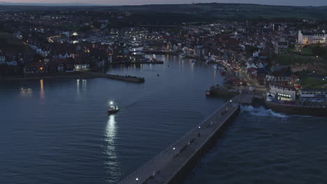 North-York-Moors,-Whitby-Harbour,-Drone-over-River-Esk-at-dawn-blue-hour