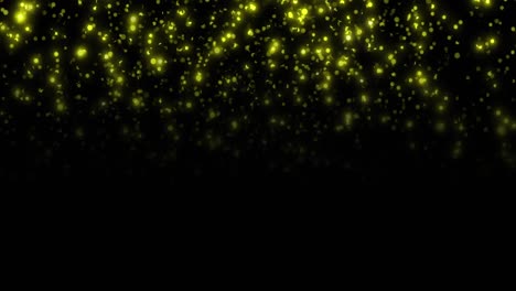 Animation-of-glowing-spots-of-yellow-light-on-black-background