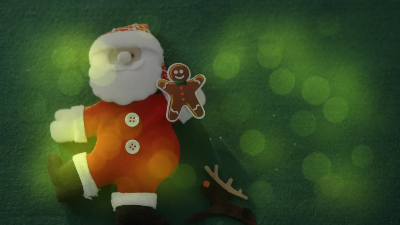 animación de santa claus y el hombre de pan de jengibre decoración navideña en verde