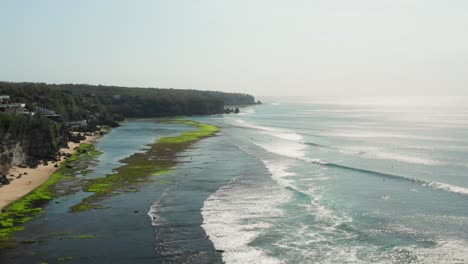 the town of bingin at the cliffs of uluwatu during low tide