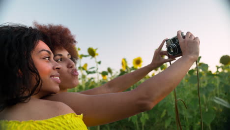 women in a sunflower field