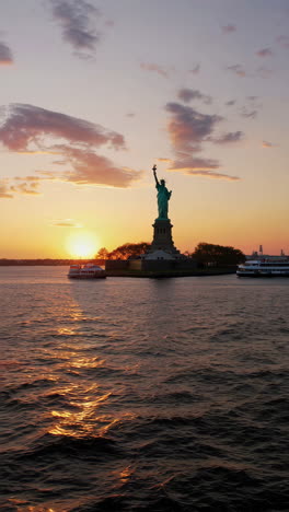 views of the statue of liberty at sunset