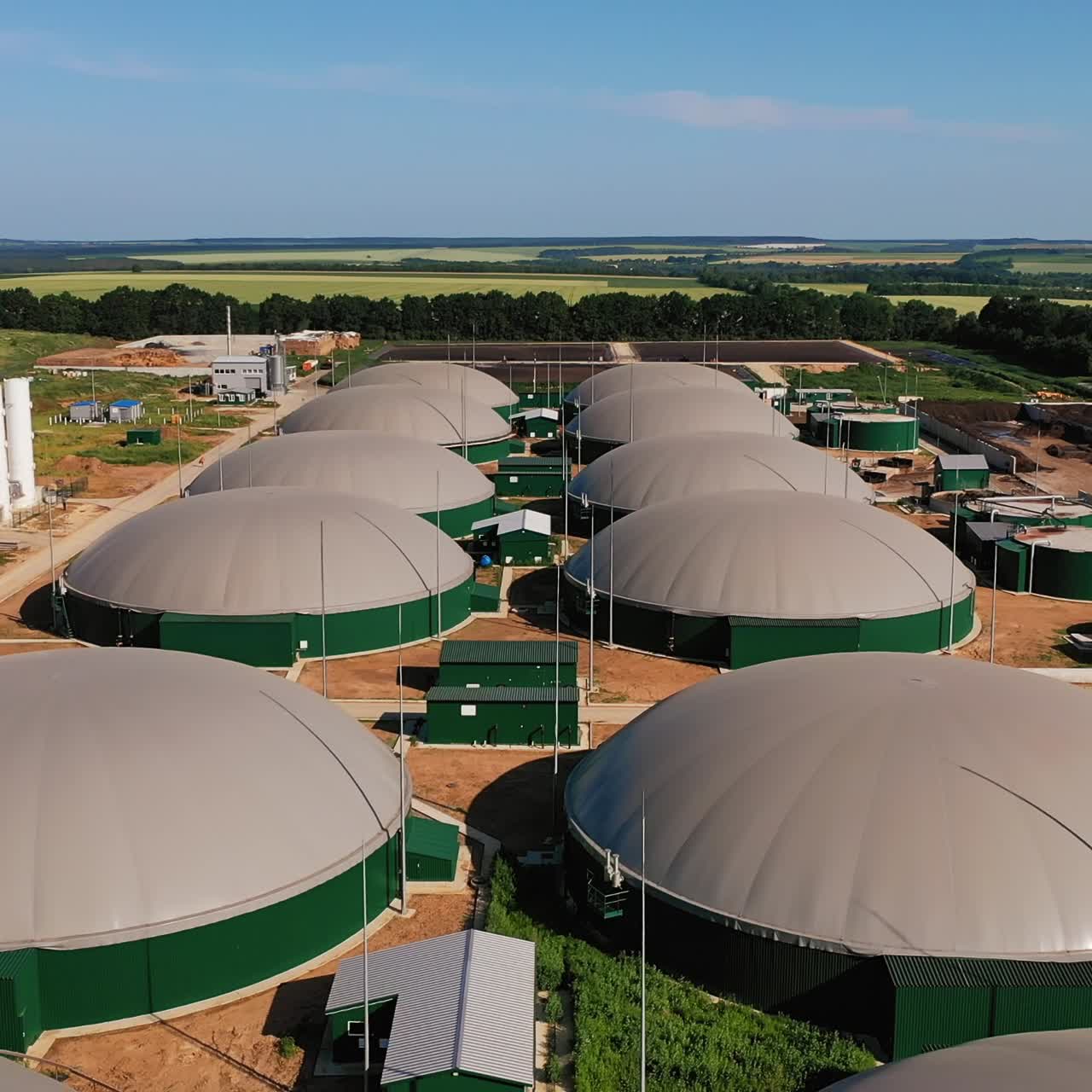 Innovative storage tanks for bio gas. Up-to-date plant for producing renewable energy from biomass. Aerial perspective