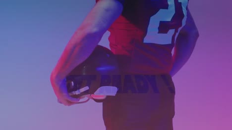 animation of get ready text over american football player and neon triangles