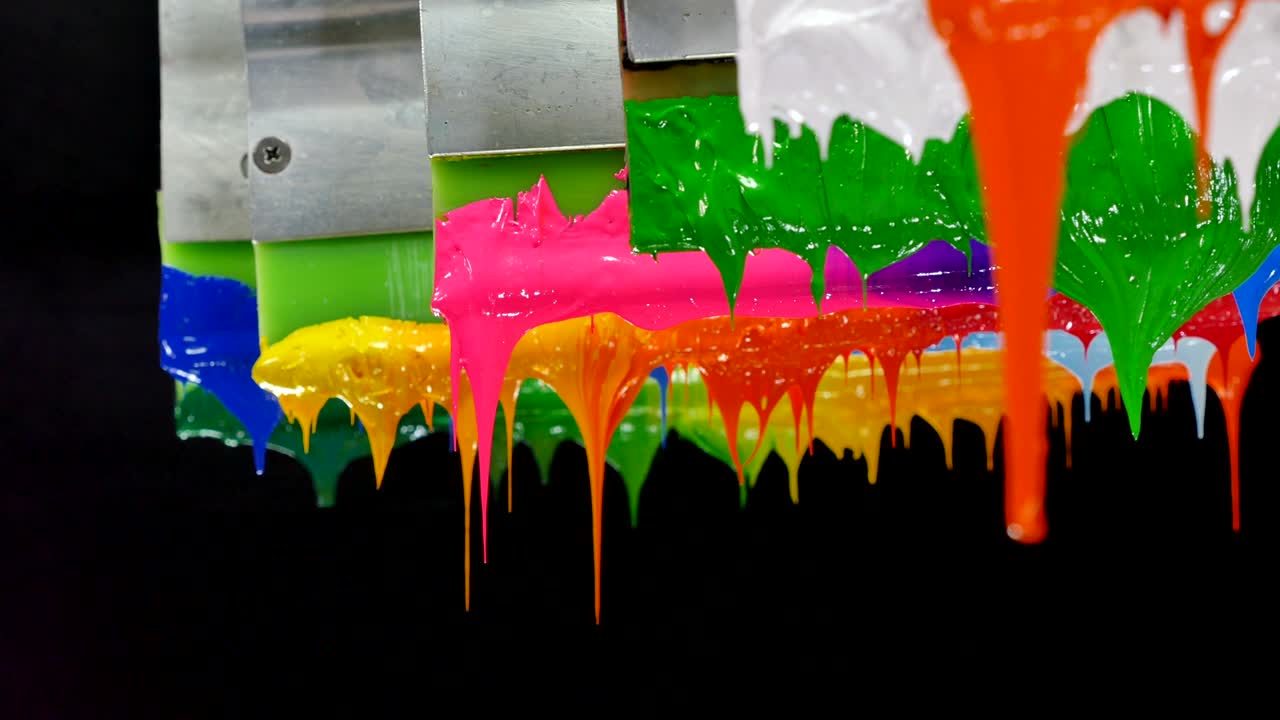 colorful colors are dripping from printer handle
