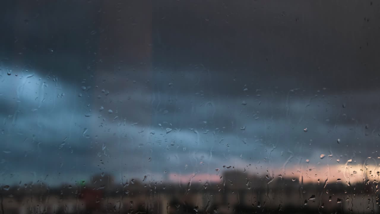 Rainy Sunset View Through a Window