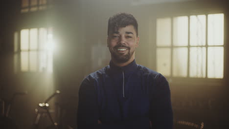 smiling man in a workshop