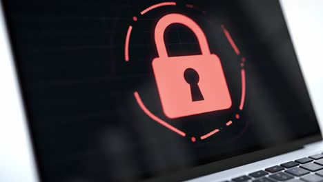 laptop screen showing a red lock icon