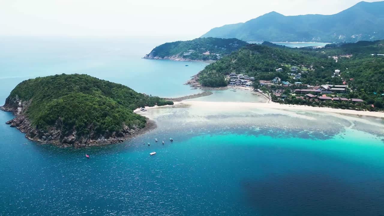 Drone Aerial Above Ko Pha Ngan or Koh Phangan Island in Gulf of Thailand , Koh Nang Yuan Island white sand beach