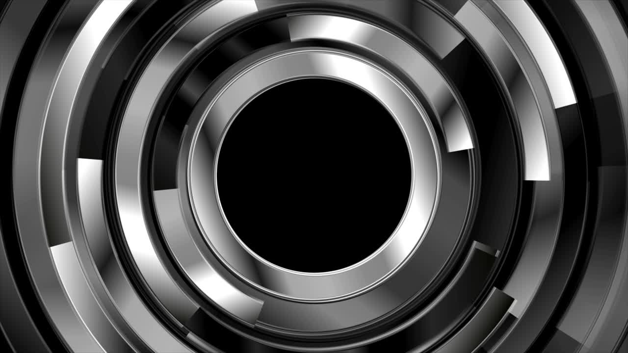メタリックな円形を持つテクノロジーの抽象的なモーション背景