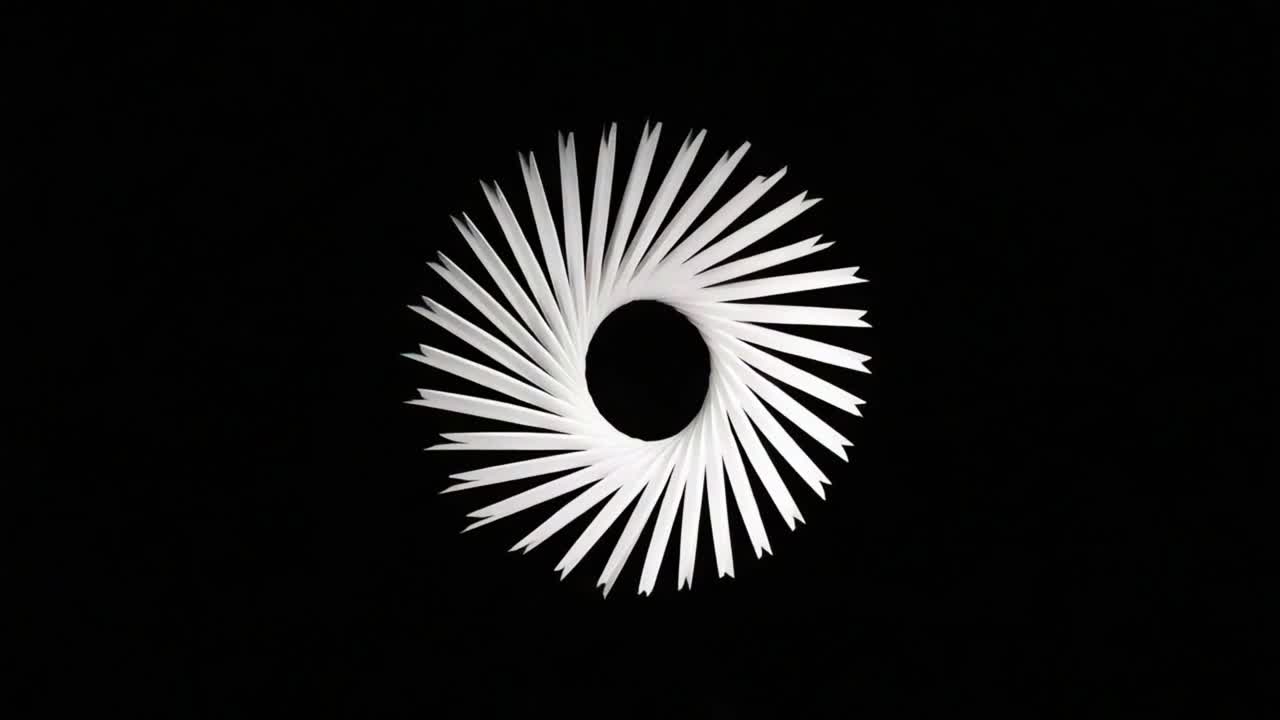 An Artistic Representation of Circular Symmetry with Dynamic White Fan-Like Structure Against a Dark Background, Highlighting Innovative Design and Aesthetics