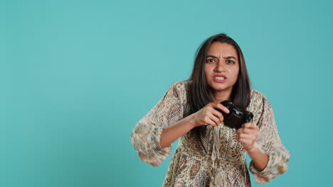 Woman-upset-after-seeing-game-over-message,-holding-controller