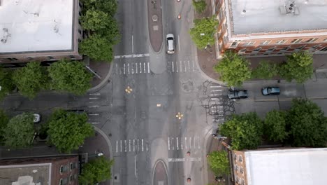 downtown ypsilanti, michigan intersection with drone video overhead stable