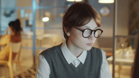 Young-Businesswoman-Working-on-Computer-in-Night-Office