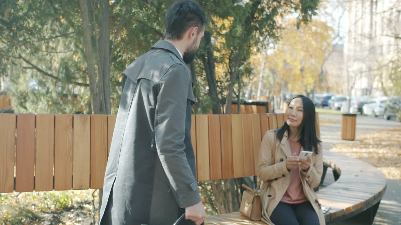 Business People Meeting in Park