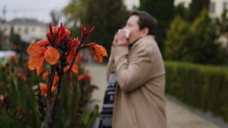 person with allergy near flowers