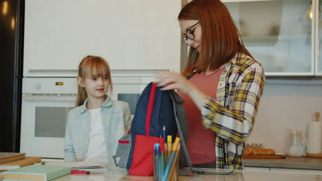 mother and daughter getting ready for school