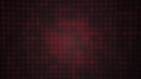 animation of multiple red circles in row on black background