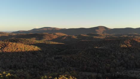 Drone-flying-around-Blue-Ridge-Mountains-in-Virginia,-USA-at-golden-hour