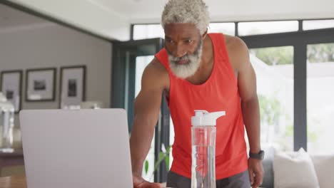 Video-of-african-american-senior-man-practicing-at-home