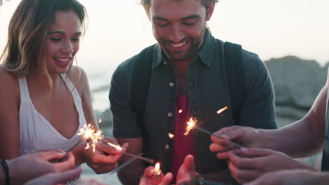 friends, sparklers and beach celebration