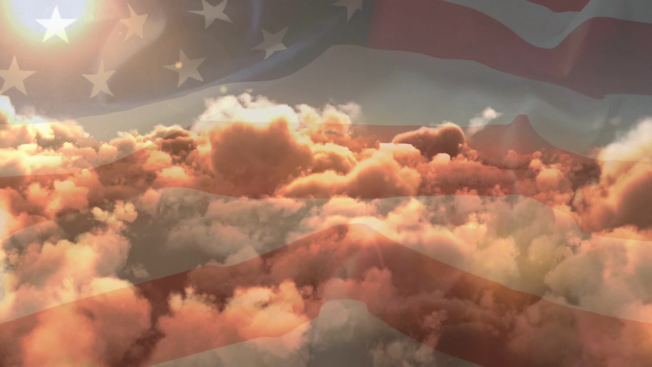 Bright light appearing top-left, US flag overlay rising as golden clouds billowing, evoking sunrise