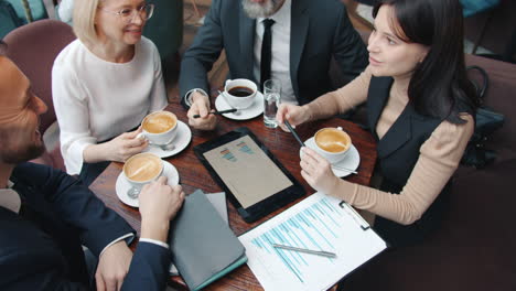 business team meeting in a coffee shop