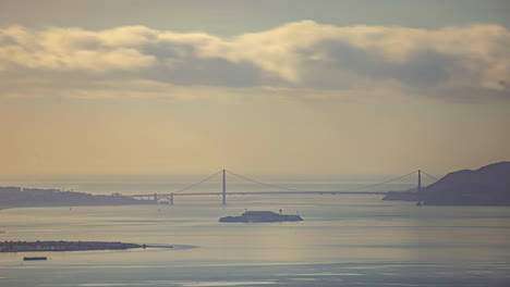 san francisco bay with alcatraz and golden gate bridge, golden hour time-lapse