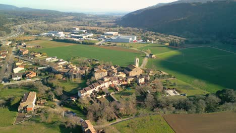 aerial images of argelaguer, a small village between mountains in the garrotxa area in girona