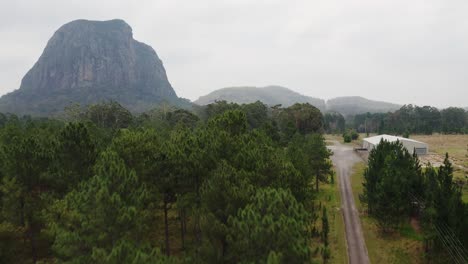 Country-Road-In-Dense-Woodland-In-Glass-House-Mountains,-Sunshine-Coast-Region,-Queensland,-Australia