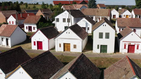 rows of typical wine cellars in palkonya village, hungary