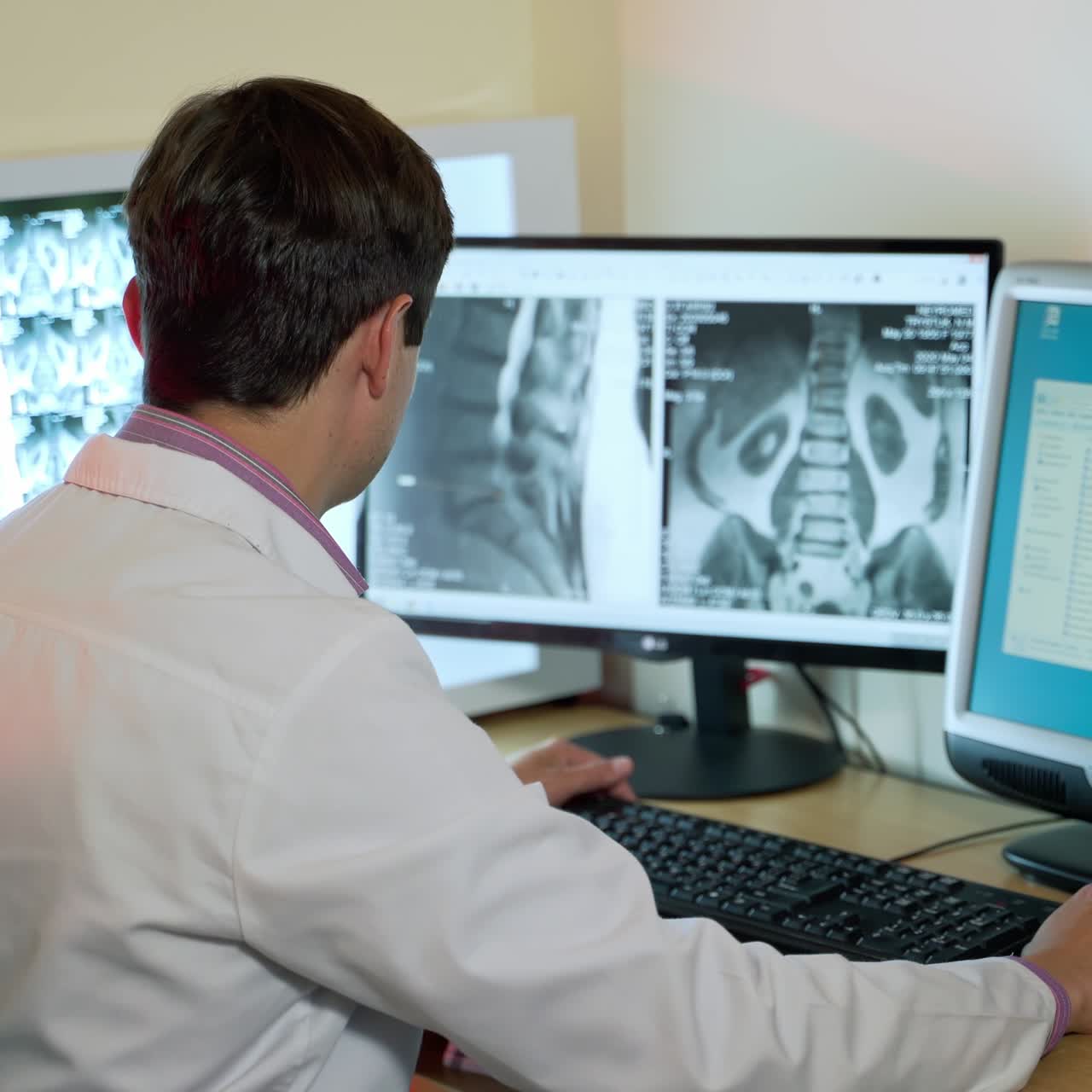 Doctor using computer in the hospital. Medical Scientist working on personal computer in laboratory