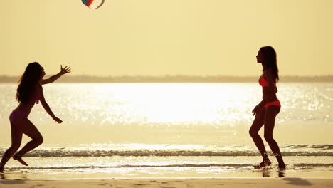 happy african american asian chinese girls on beach