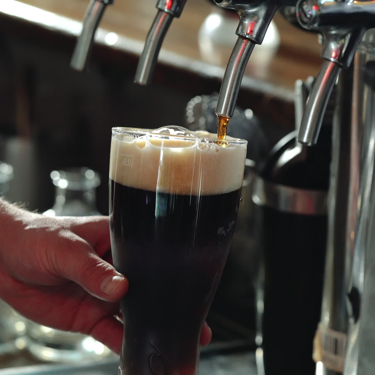 Bartender Pouring Glass of Stout Beer. Sqare video
