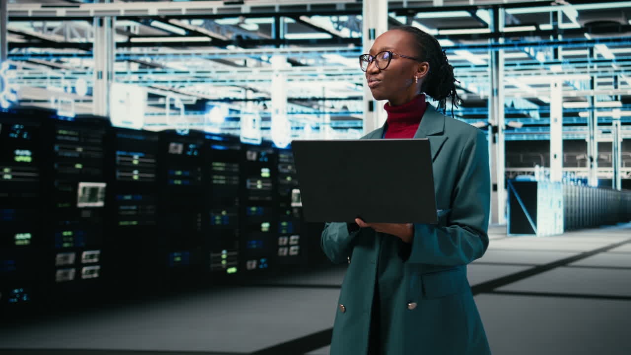 Young Black Woman Working on Laptop in Futuristic Data Center