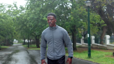 man running in the rain