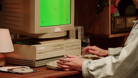 Person working on a vintage computer